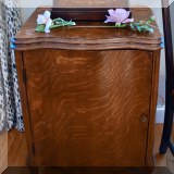 F17. Oak sewing cabinet with White sewing machine. 